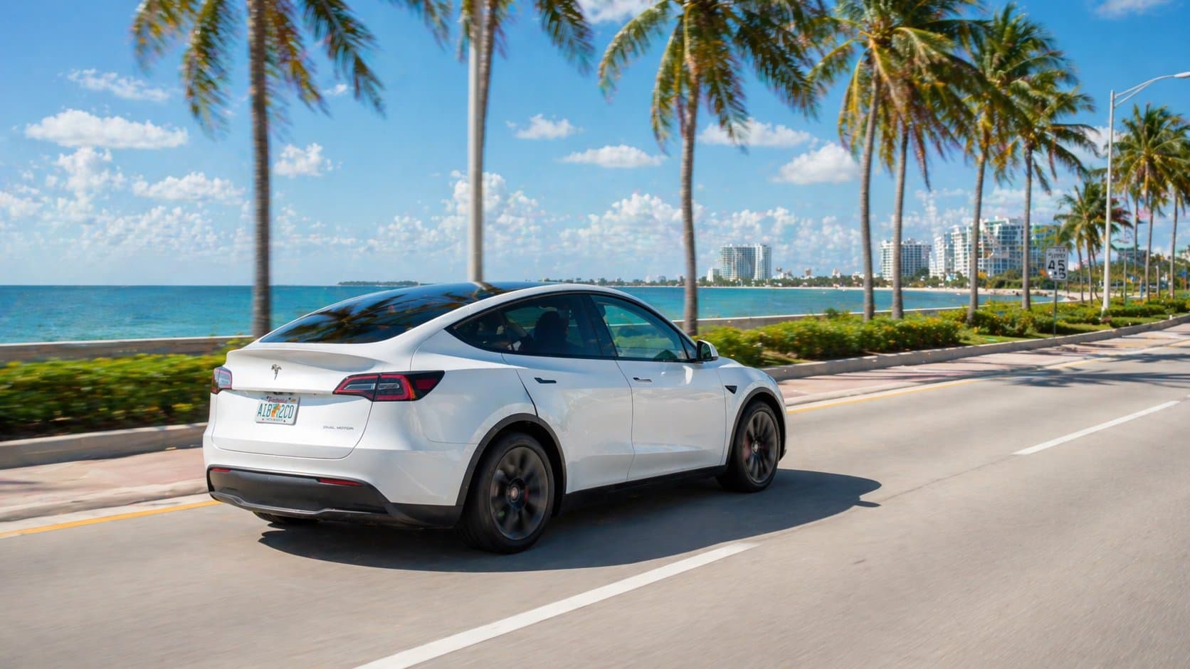 EV driving on a Florida coastal road